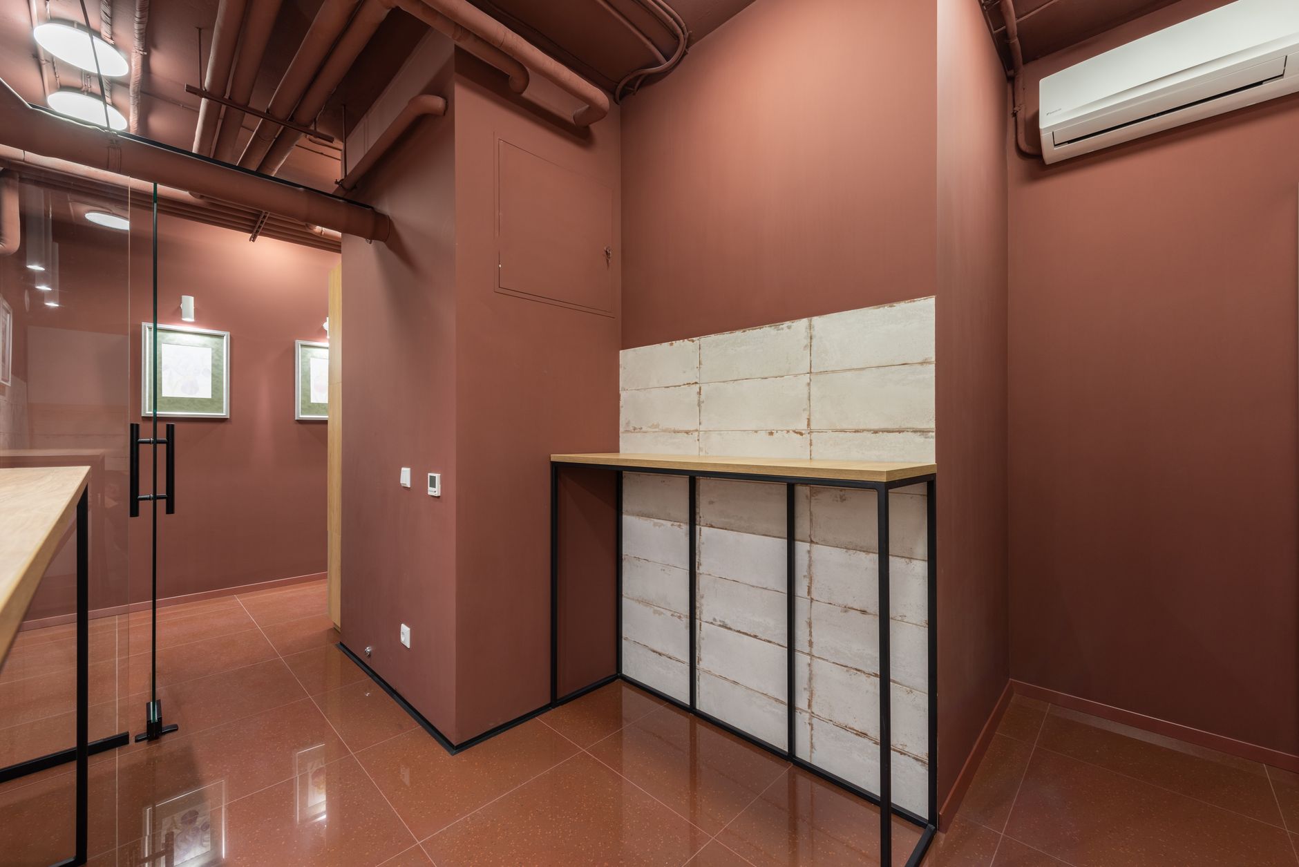 Studio reception with terracotta walls